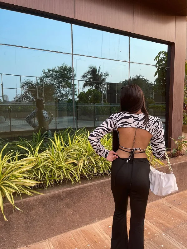 Sheane White zebra backless top